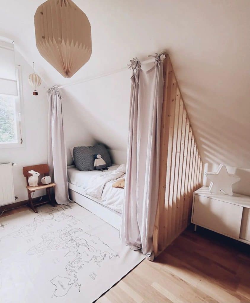 Kids bedroom nook with teepee canopy bed and world map rug